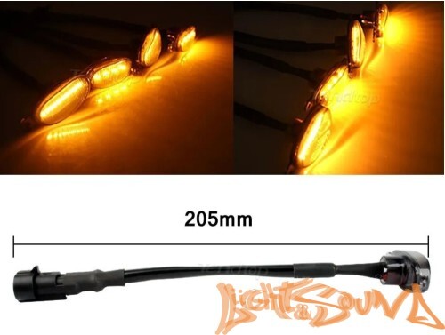 Ходовые габаритные огни в решетку радиатора черные (тонированные) овальные, оранжевый цвет 12В, 4шт
